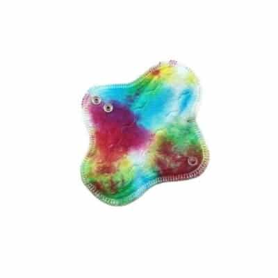 A 7" cloth menstrual pad featuring rainbow dyed bamboo velour top fabric and merino wool water resistant backing.