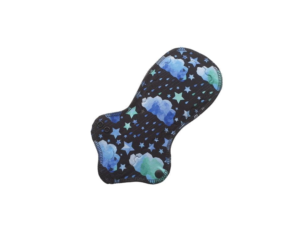 A Frontbleeder shape cloth pad with Blue Kaledoscope Sky cotton jersey top fabric.